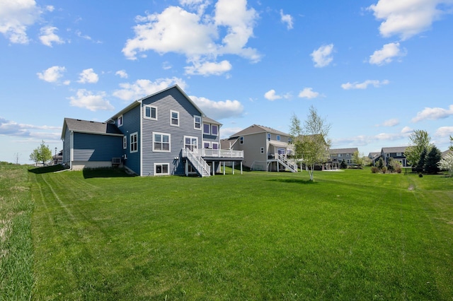 4118 San Vitero Ct, Victoria, MN 55318 - back of property with stairs, a deck, and a yard