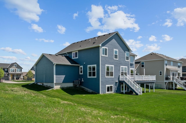 4118 San Vitero Ct, Victoria, MN 55318 - back of property featuring stairs, central air condition unit, a deck, and a yard