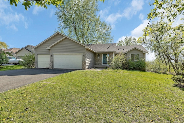 7320 Deer Pass Dr, Centerville, MN 55038 - single story home with an attached garage, asphalt driveway, a front yard, and a shingled roof