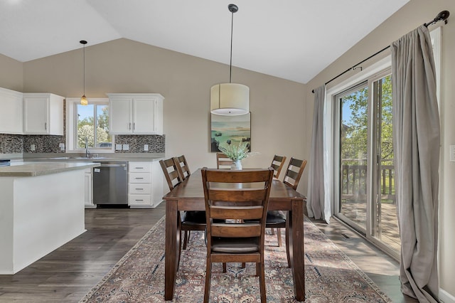 7320 Deer Pass Dr, Centerville, MN 55038 - dining room featuring vaulted ceiling and dark wood-style flooring
