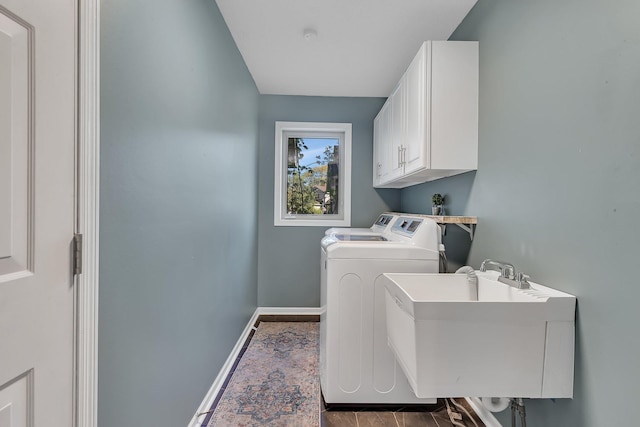 7320 Deer Pass Dr, Centerville, MN 55038 - washroom featuring cabinet space, washer and dryer, and baseboards
