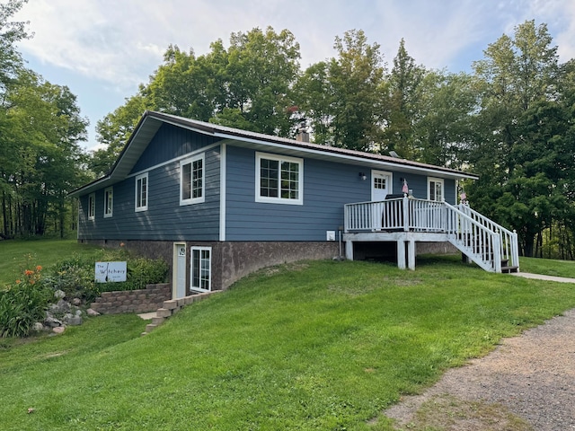 791 W Rd, Wright, MN 55798 - single story home with a deck and a front yard