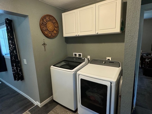 791 W Rd, Wright, MN 55798 - laundry room featuring independent washer and dryer, dark wood-type flooring, a textured ceiling, baseboards, and cabinet space