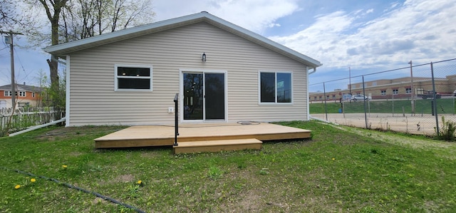 703 2nd St, Henning, MN 56551 - rear view of house featuring a deck