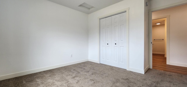 703 2nd St, Henning, MN 56551 - unfurnished bedroom featuring carpet, a closet, and baseboards