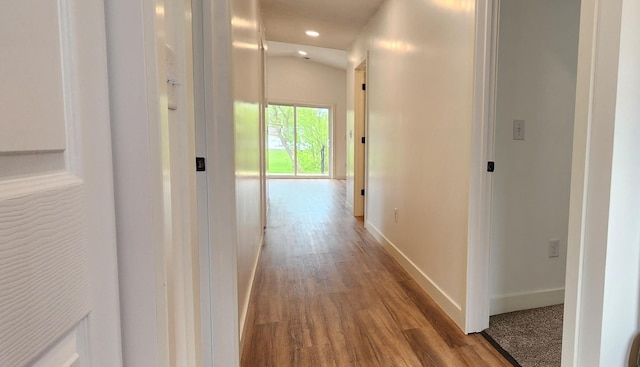 703 2nd St, Henning, MN 56551 - corridor featuring baseboards, wood finished floors, and recessed lighting