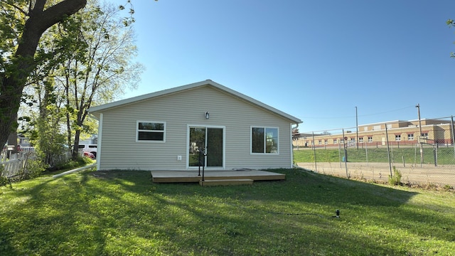 703 2nd St, Henning, MN 56551 - rear view of property featuring a deck