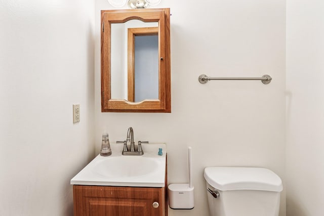 6012 Beard Ave N, Brooklyn Center, MN 55429 - bathroom featuring toilet and vanity