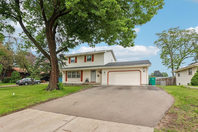 6012 Beard Ave N, Brooklyn Center, MN 55429 - traditional-style house with driveway and an attached garage