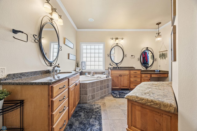 3914 21st Ave S, Moorhead, MN 56560 - full bathroom featuring crown molding, a garden tub, tile patterned floors, and two vanities