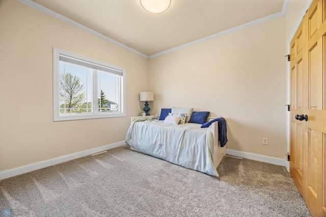 3914 21st Ave S, Moorhead, MN 56560 - carpeted bedroom featuring ornamental molding and baseboards