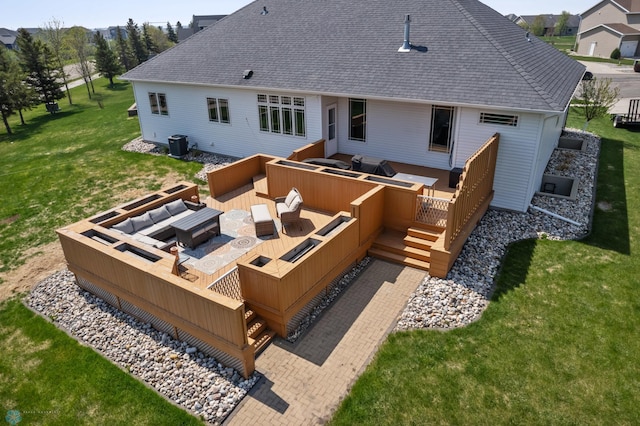 3914 21st Ave S, Moorhead, MN 56560 - back of house featuring an outdoor hangout area, a wooden deck, central air condition unit, a lawn, and a shingled roof