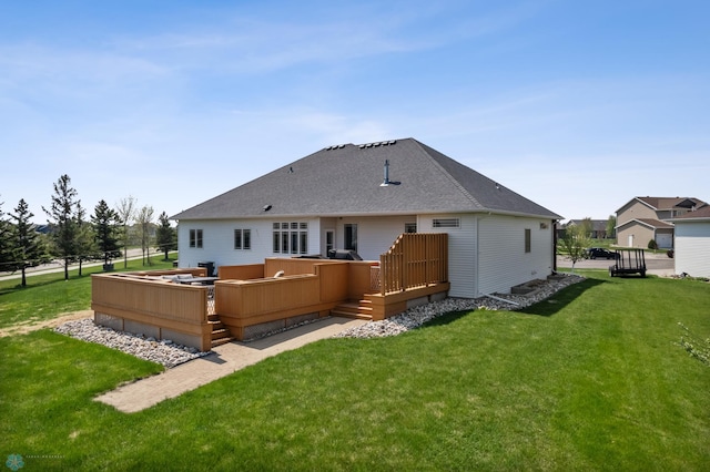 3914 21st Ave S, Moorhead, MN 56560 - back of property featuring a lawn, a wooden deck, and roof with shingles