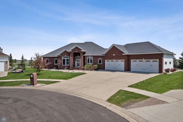 3914 21st Ave S, Moorhead, MN 56560 - ranch-style house with concrete driveway, a garage, brick siding, and a front yard