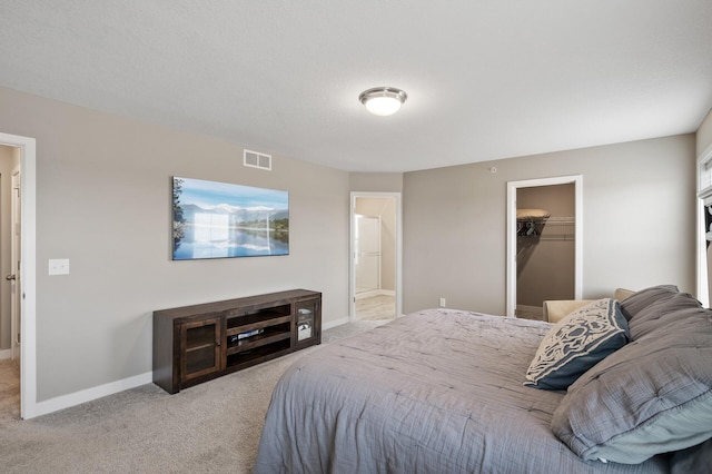 19000 72nd Pl N, Maple Grove, MN 55311 - bedroom featuring carpet, baseboards, a walk in closet, and a closet