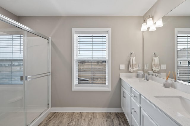 19000 72nd Pl N, Maple Grove, MN 55311 - full bath featuring healthy amount of natural light, a shower stall, baseboards, and double vanity
