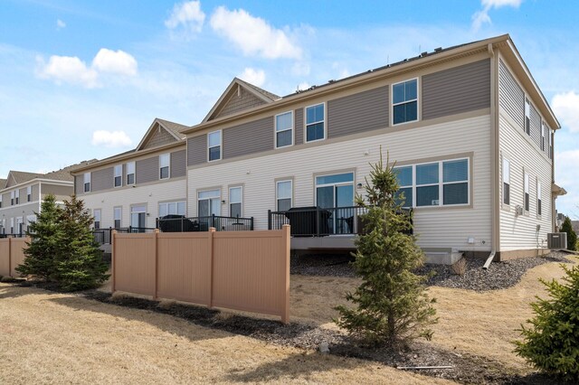 19000 72nd Pl N, Maple Grove, MN 55311 - back of house featuring cooling unit and fence