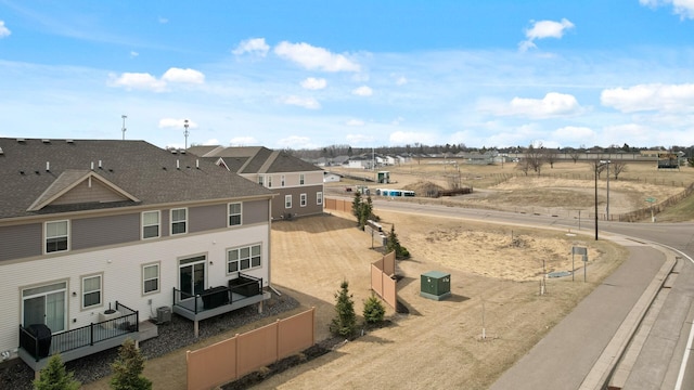 19000 72nd Pl N, Maple Grove, MN 55311 - view of asphalt street with sidewalks, a residential view, and street lighting