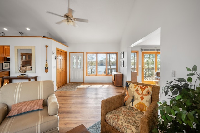 29825 Minerva Cir, Swiss Twp, WI 54830 - living area featuring ceiling fan, light wood finished floors, recessed lighting, vaulted ceiling, and baseboards