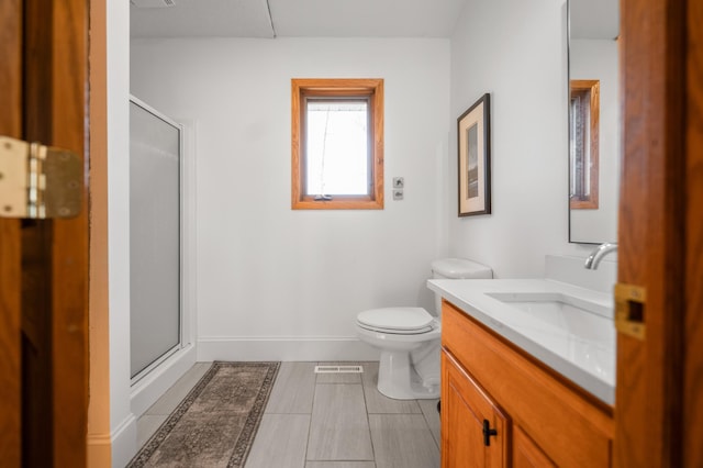 29825 Minerva Cir, Swiss Twp, WI 54830 - full bathroom featuring a shower stall, toilet, vanity, and baseboards