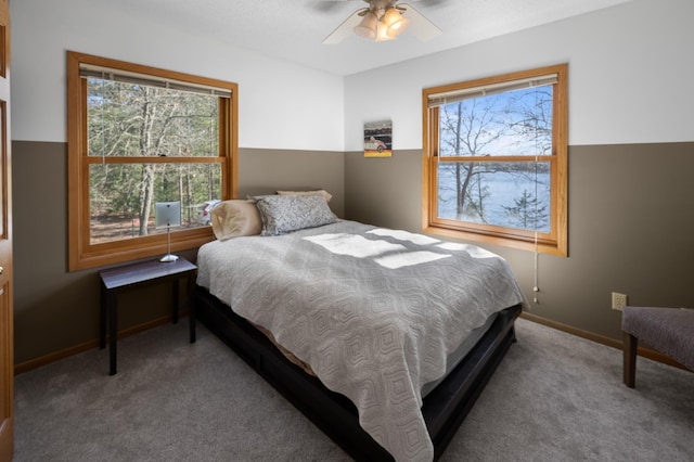 29825 Minerva Cir, Swiss Twp, WI 54830 - bedroom with carpet, a ceiling fan, and baseboards