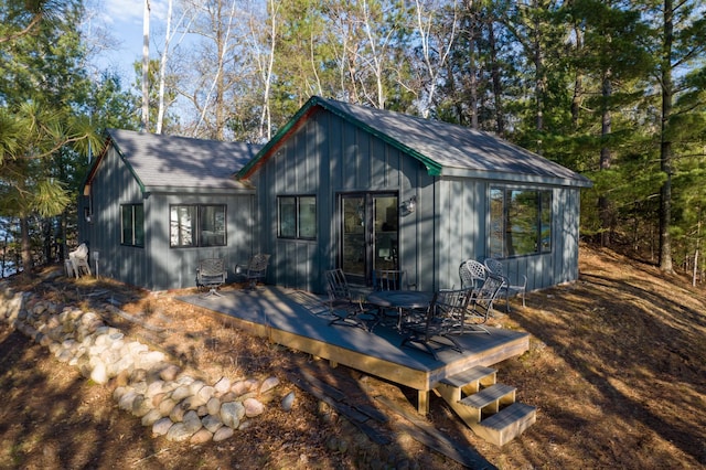 29825 Minerva Cir, Swiss Twp, WI 54830 - back of property with a deck and a shingled roof