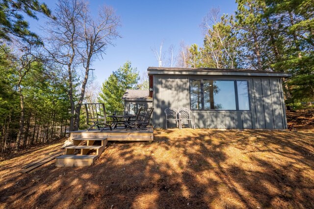 29825 Minerva Cir, Swiss Twp, WI 54830 - rear view of house featuring a wooden deck
