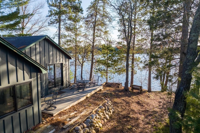 29825 Minerva Cir, Swiss Twp, WI 54830 - view of yard featuring a water view and a patio area