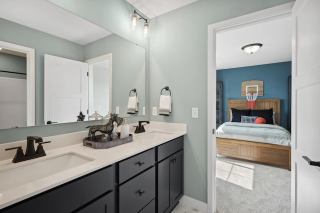 ensuite bathroom featuring double vanity