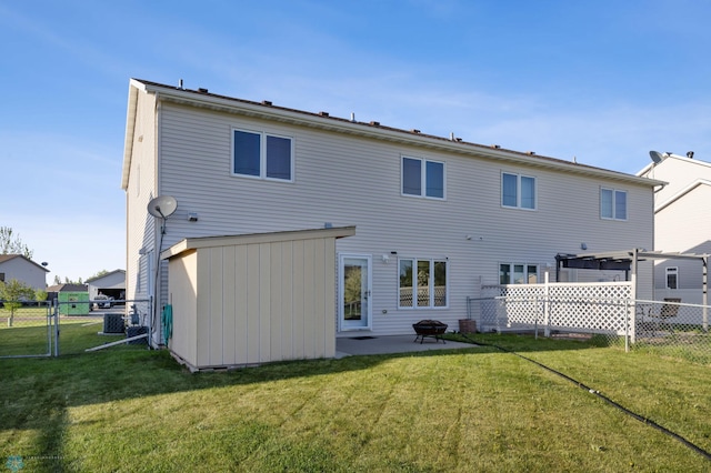 rear view of house featuring a patio area and central AC unit