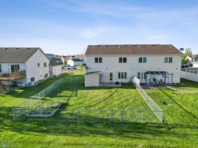 rear view of property featuring a residential view and a patio