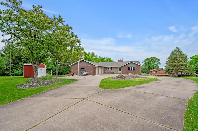 32355 Nottingham Ct, Chisago Lake Twp, MN 55045 - single story home featuring driveway, brick siding, a front yard, a chimney, and an attached garage