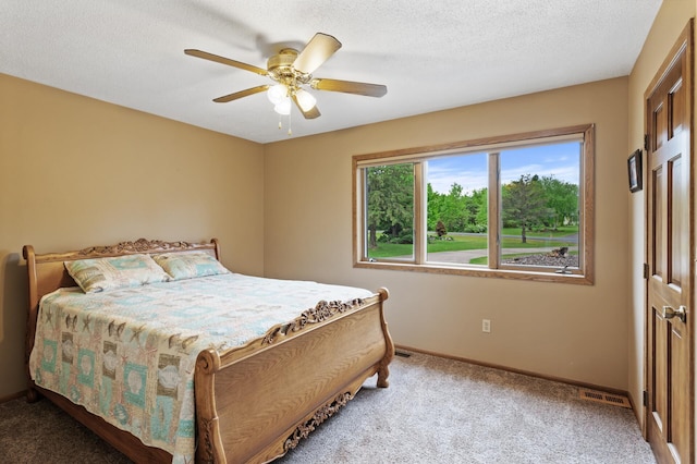 32355 Nottingham Ct, Chisago Lake Twp, MN 55045 - bedroom with light carpet, baseboards, ceiling fan, and a textured ceiling