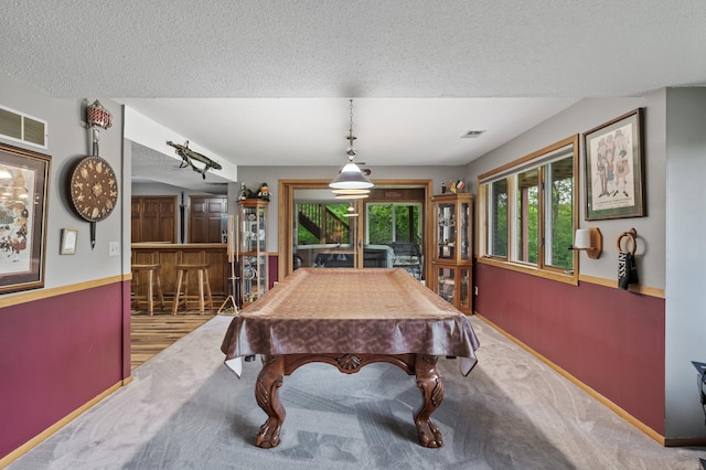 32355 Nottingham Ct, Chisago Lake Twp, MN 55045 - rec room with billiards table, a dry bar, a textured ceiling, carpet, and baseboards