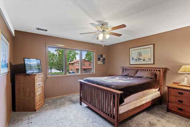32355 Nottingham Ct, Chisago Lake Twp, MN 55045 - bedroom featuring carpet, a textured ceiling, ceiling fan, and baseboards