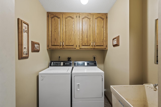 32355 Nottingham Ct, Chisago Lake Twp, MN 55045 - laundry area featuring independent washer and dryer and cabinet space