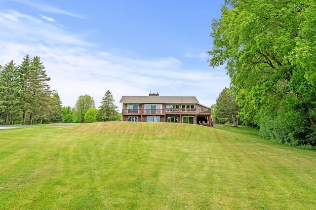 32355 Nottingham Ct, Chisago Lake Twp, MN 55045 - back of property with a lawn and a deck