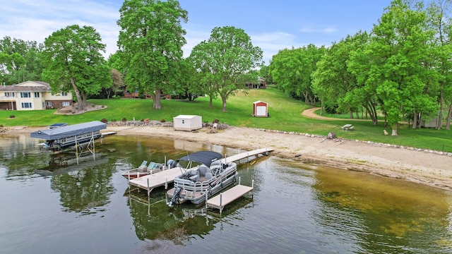 32355 Nottingham Ct, Chisago Lake Twp, MN 55045 - dock featuring a water view, a lawn, and view of wooded area