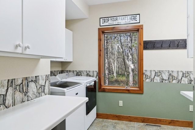 12640 Fawn Lake Rd, Crosslake, MN 56442 - laundry room featuring washer and dryer, cabinet space, and baseboards