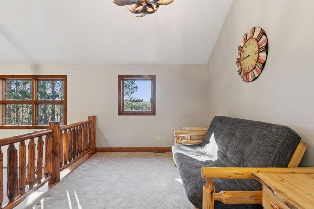 12640 Fawn Lake Rd, Crosslake, MN 56442 - sitting room featuring healthy amount of natural light, vaulted ceiling, carpet, and baseboards