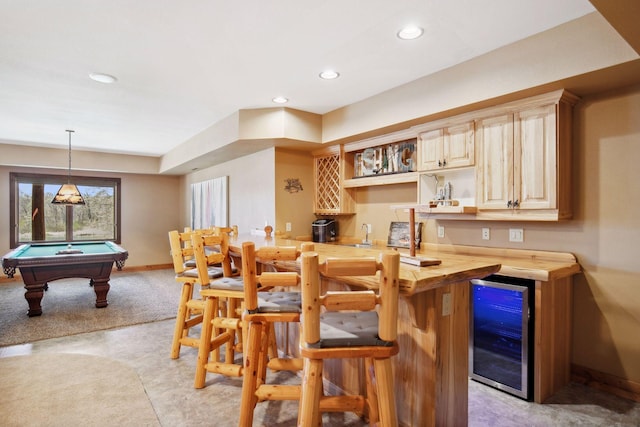 12640 Fawn Lake Rd, Crosslake, MN 56442 - indoor wet bar with beverage cooler, pool table, recessed lighting, decorative light fixtures, and baseboards