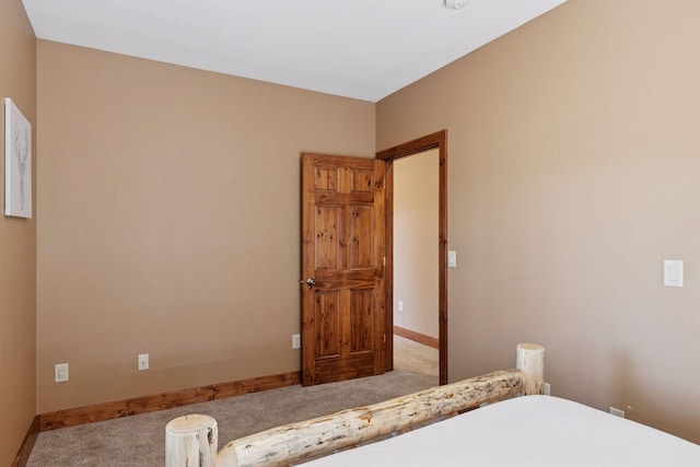 12640 Fawn Lake Rd, Crosslake, MN 56442 - bedroom with carpet flooring and baseboards