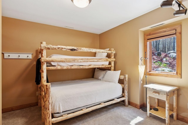 12640 Fawn Lake Rd, Crosslake, MN 56442 - carpeted bedroom with baseboards