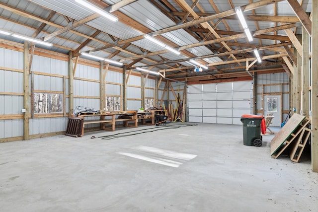 12640 Fawn Lake Rd, Crosslake, MN 56442 - garage with metal wall and a garage door opener