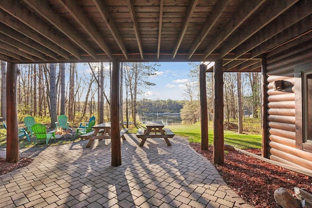 12640 Fawn Lake Rd, Crosslake, MN 56442 - view of patio featuring an outdoor fire pit