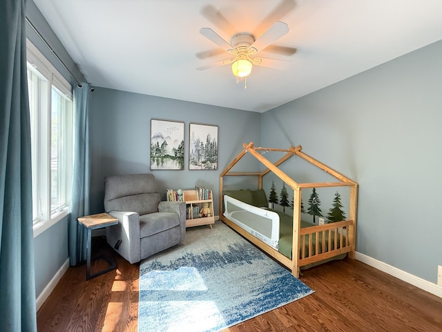 14700 Minnehaha Pl, Minnetonka, MN 55391 - bedroom with wood finished floors, baseboards, and a ceiling fan