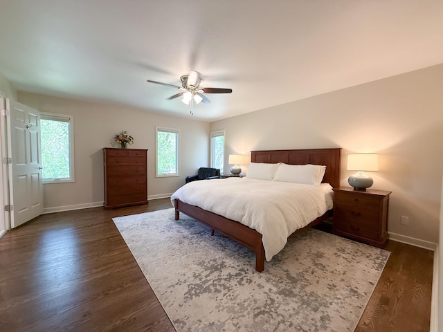 14700 Minnehaha Pl, Minnetonka, MN 55391 - bedroom with baseboards, dark wood-type flooring, and a ceiling fan