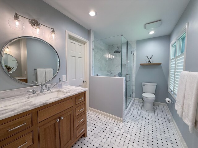 14700 Minnehaha Pl, Minnetonka, MN 55391 - full bath with toilet, vanity, baseboards, a shower stall, and recessed lighting