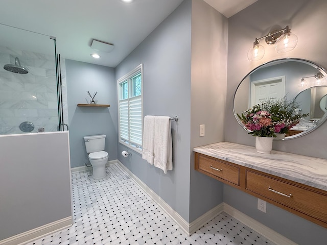 14700 Minnehaha Pl, Minnetonka, MN 55391 - full bath featuring a walk in shower, toilet, baseboards, vanity, and tile patterned floors
