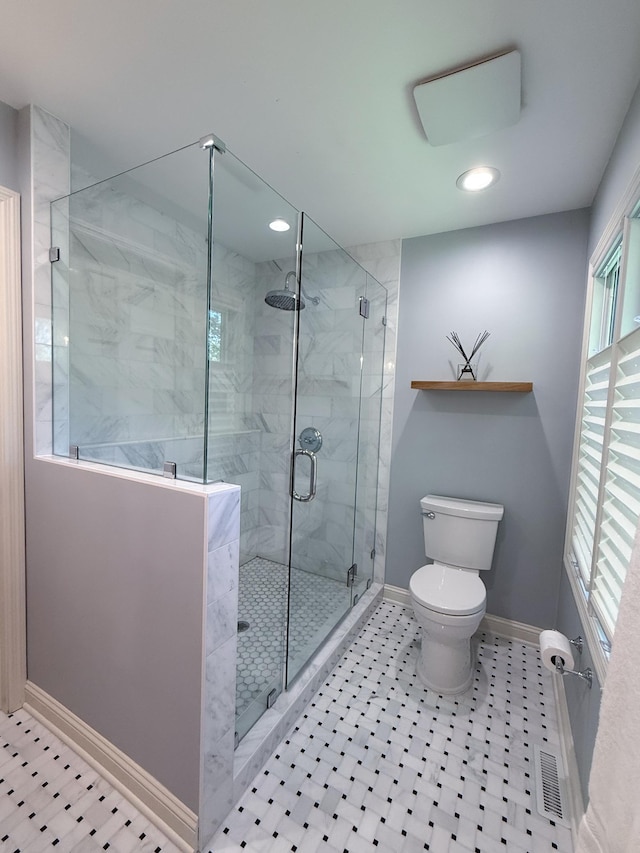 14700 Minnehaha Pl, Minnetonka, MN 55391 - bathroom with baseboards, toilet, a stall shower, and recessed lighting